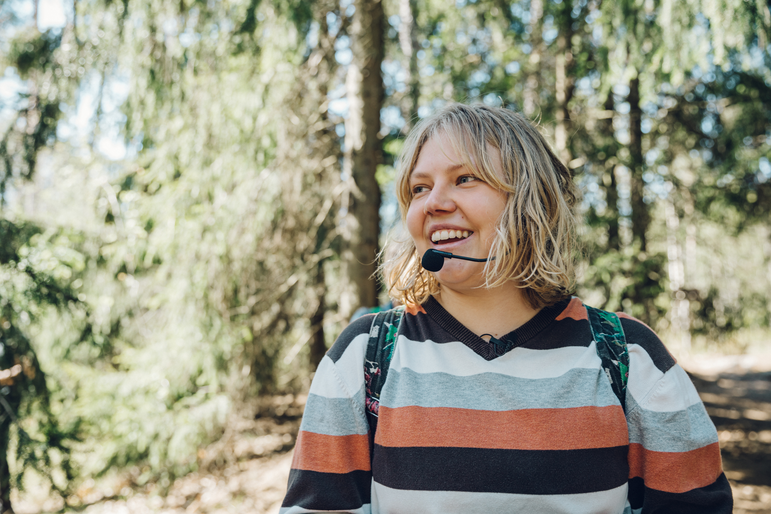 Young person smiling in Stansvik forest